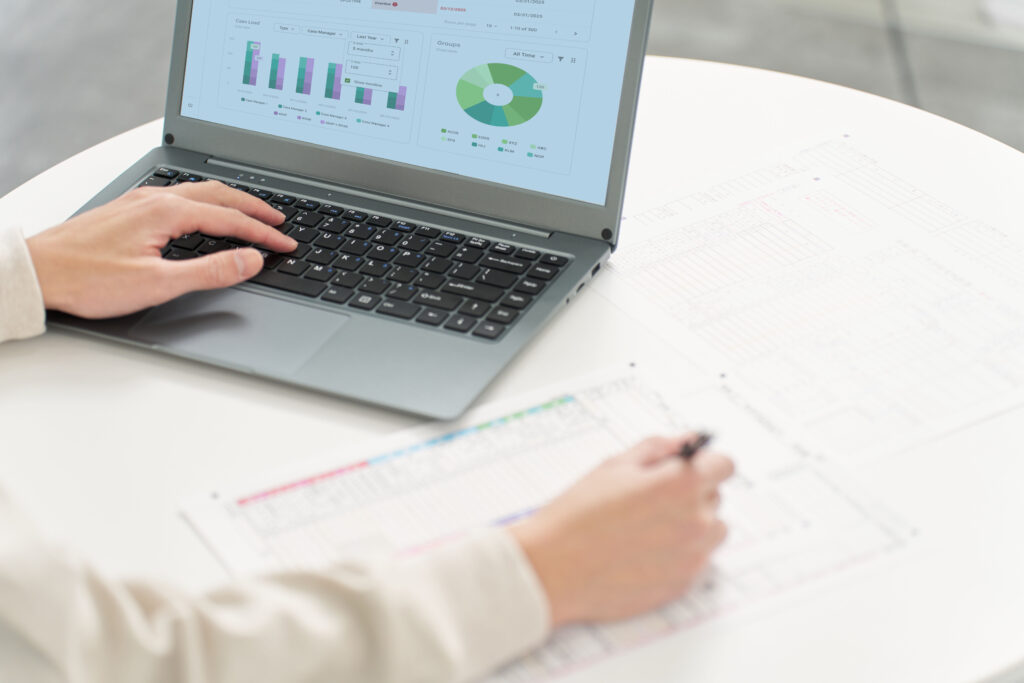 Hand of a man using accounting software